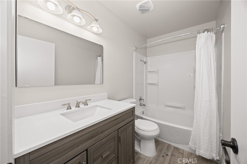 9862 Solazzo Drive Rancho Cucamonga, CA 91730 - Photo 21 of 30 a bathroom with a sink a toilet and shower