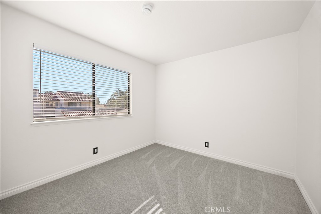 9862 Solazzo Drive Rancho Cucamonga, CA 91730 - Photo 22 of 30 a view of an empty room with a window