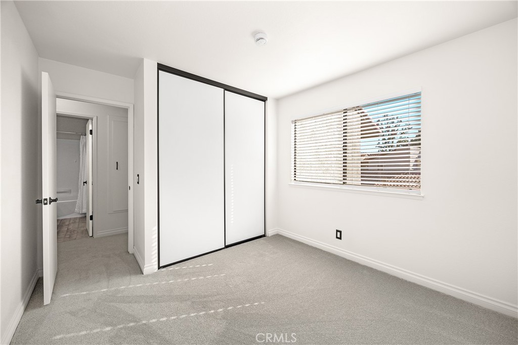 9862 Solazzo Drive Rancho Cucamonga, CA 91730 - Photo 23 of 30 an empty room with a window