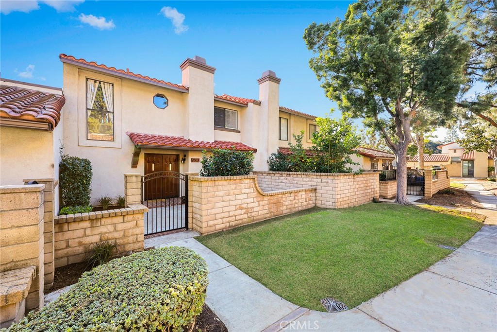 9862 Solazzo Drive Rancho Cucamonga, CA 91730 - Photo 3 of 30 a view of a house with a yard and sitting area