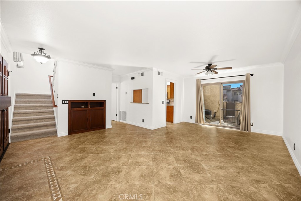 9862 Solazzo Drive Rancho Cucamonga, CA 91730 - Photo 9 of 30 a view of a kitchen with cabinet and a fireplace
