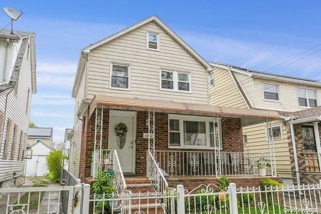 a front view of a house with a porch
