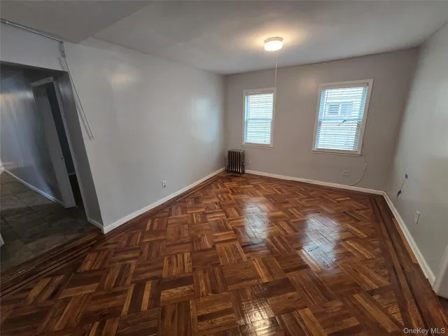 a view of an empty room and window