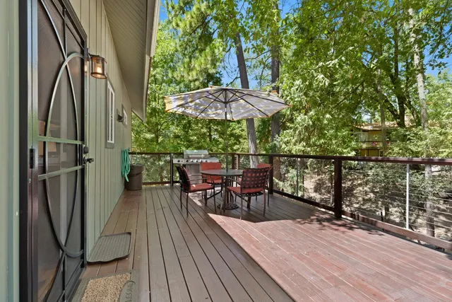 a view of a chairs and table on the wooden floor