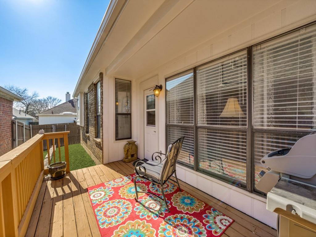 4321 Harvest Hill Road Carrollton, TX 75010 - Photo 23 of 25 a balcony with furniture and rug