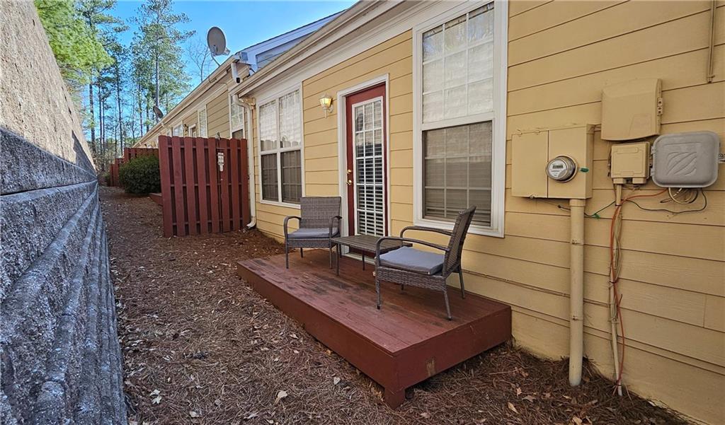 112 Camry Lane Southwest Grayson, GA 30017 - Photo 15 of 15 a view of a house with backyard and sitting area