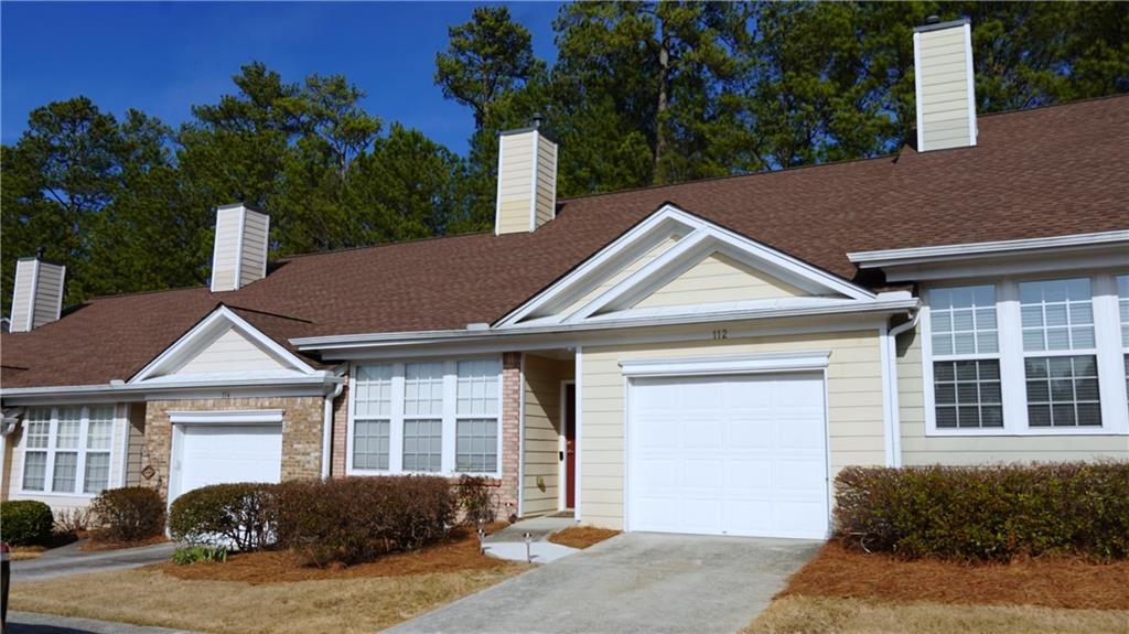 112 Camry Lane Southwest Grayson, GA 30017 - Photo 2 of 15 a view of a house with a yard