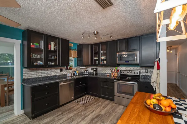 a bedroom with bed and window