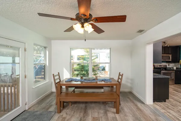 a bedroom with furniture and a window