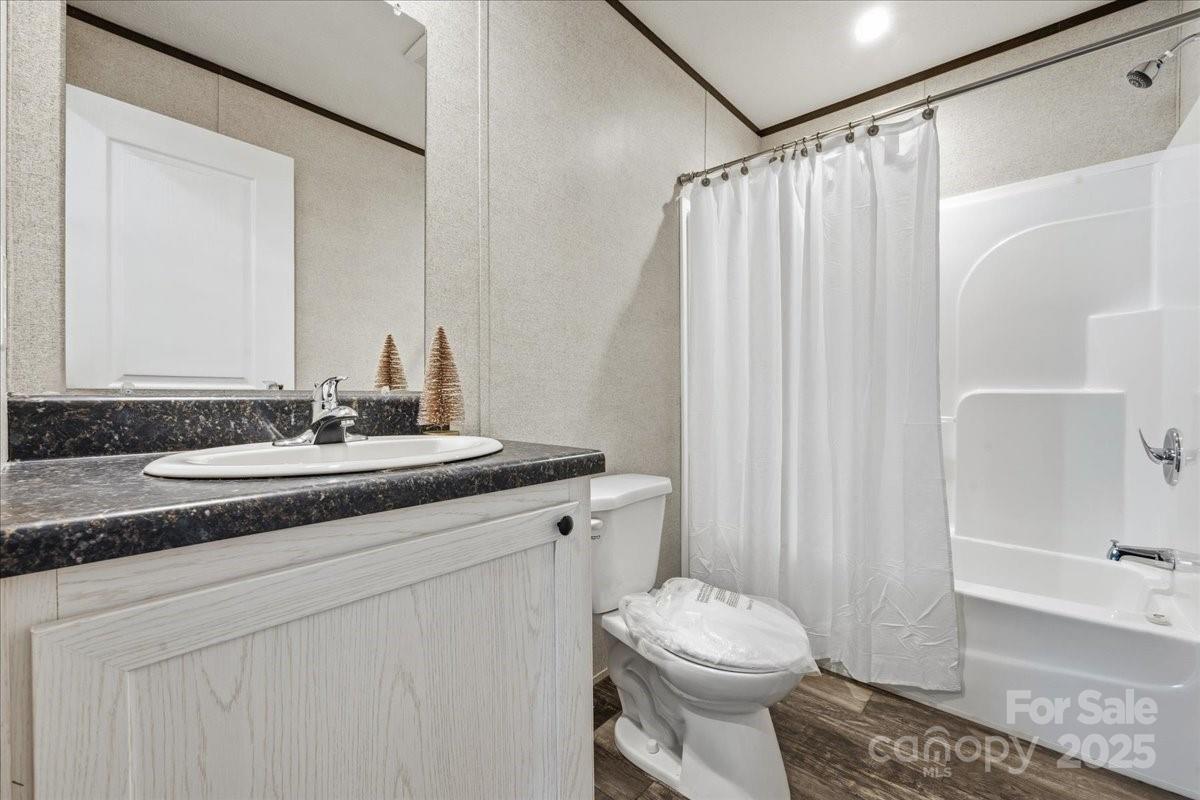 1381 Safrit Road Salisbury, NC 28146 - Photo 17 of 19 a bathroom with a sink toilet and shower