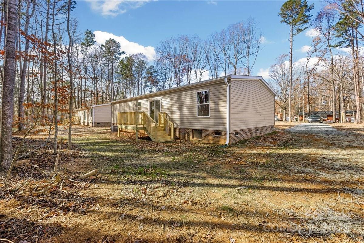 1381 Safrit Road Salisbury, NC 28146 - Photo 18 of 19 a view of a house with a yard