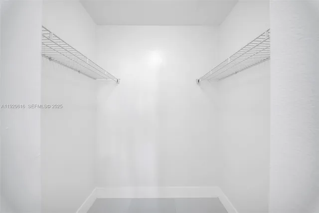 a view of small space with racks on the wall