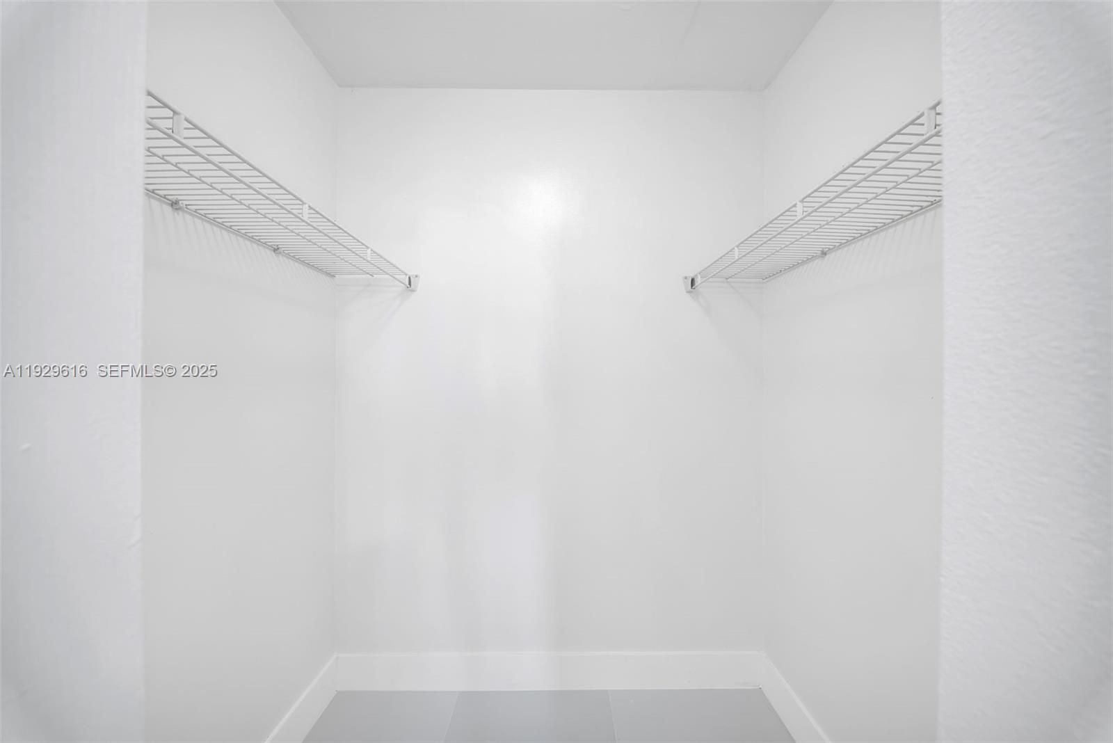 770 Claughton Island Drive, Unit 1401 Miami, FL 33131 - Photo 20 of 31 a view of small space with racks on the wall