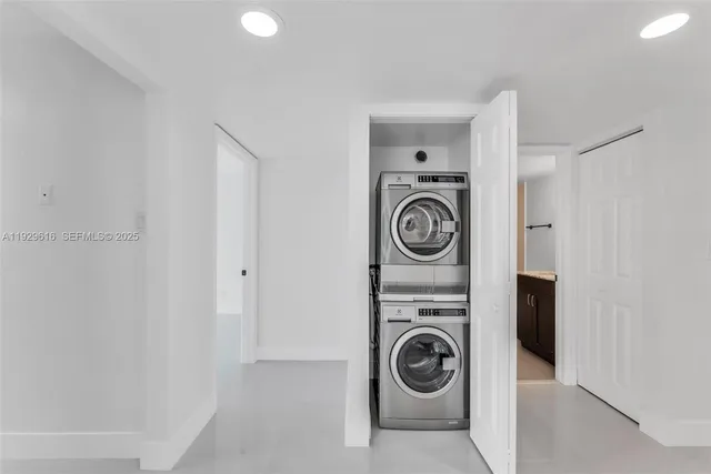 a utility room with dryer and washer