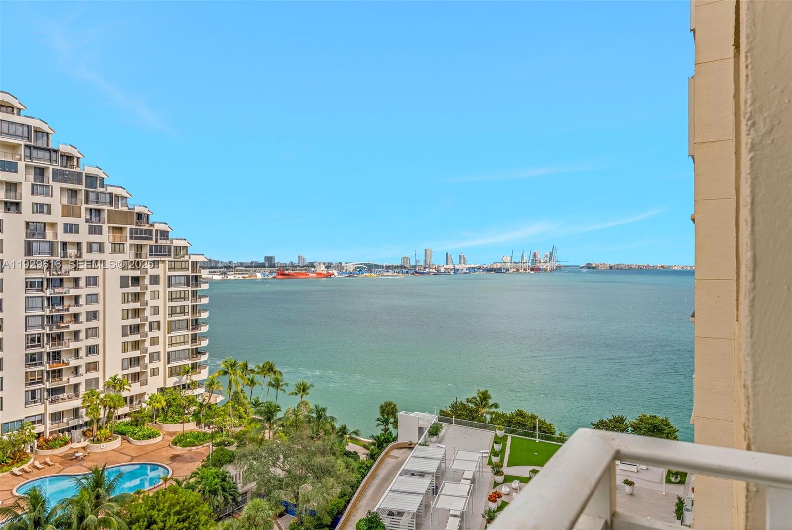 770 Claughton Island Drive, Unit 1401 Miami, FL 33131 - Photo 27 of 31 a view of a lake with a building