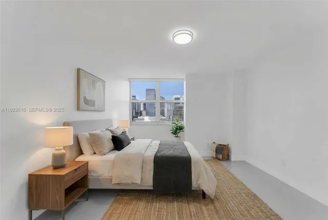 a bed room with a bed and a couch