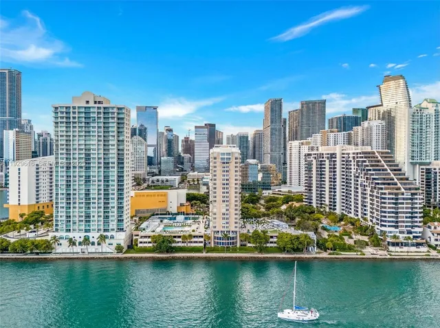 a view of a city with tall buildings