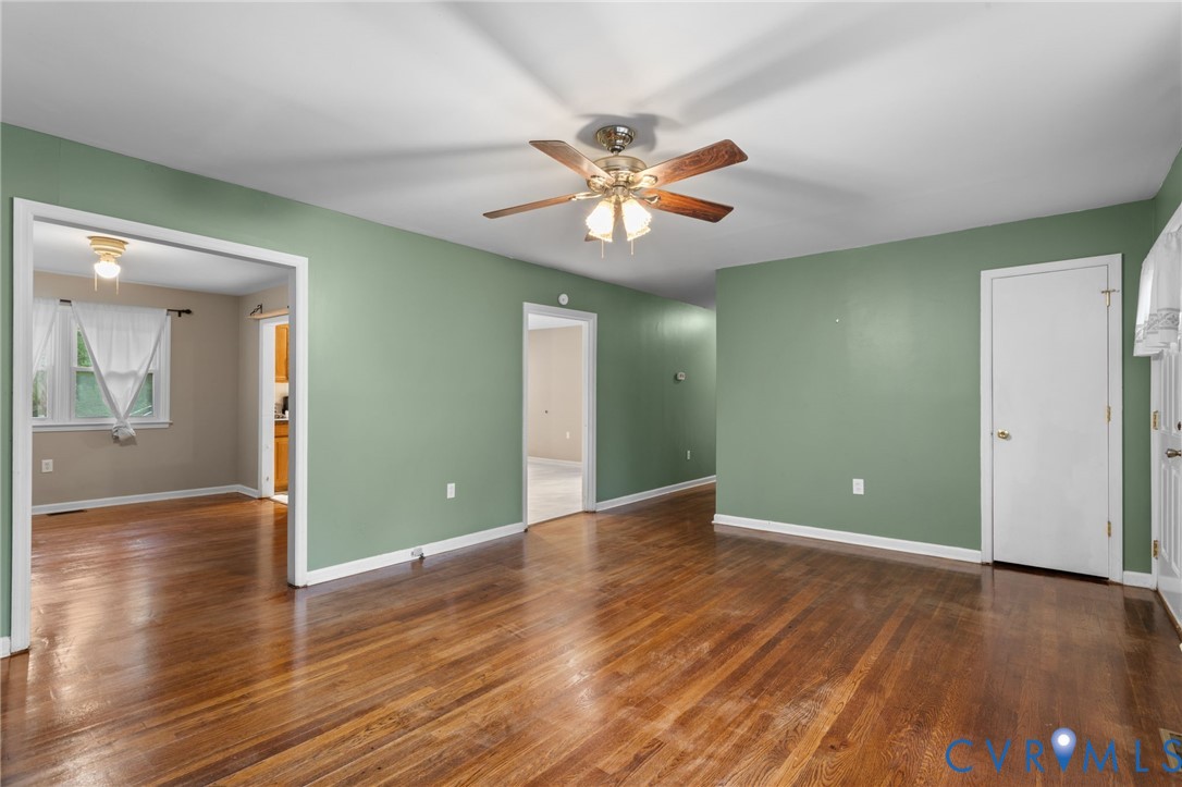 8141 Military Road Amelia Court House, VA 23002 - Photo 11 of 40 a view of empty room with wooden floor