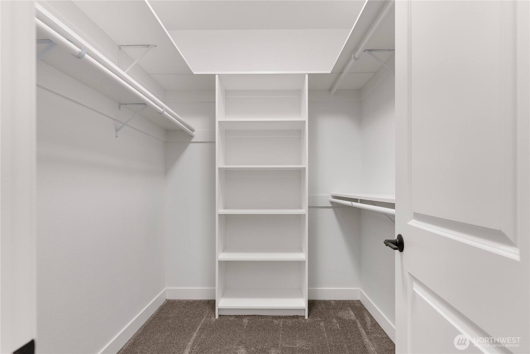 14443 Mima Road Southwest Olympia, WA 98512 - Photo 33 of 38 a view of walk in closet with empty racks