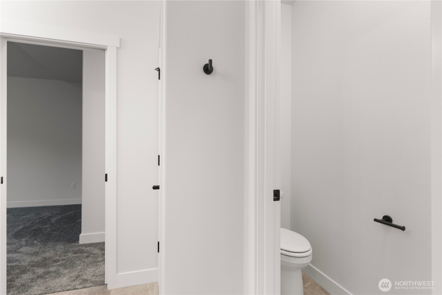 14443 Mima Road Southwest Olympia, WA 98512 - Photo 36 of 38 a bathroom with a granite countertop toilet and a sink