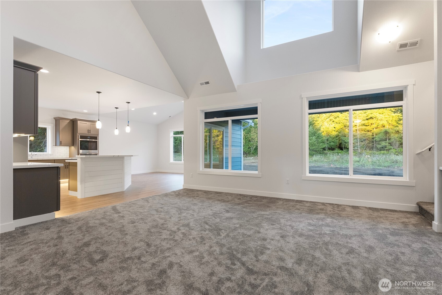 14443 Mima Road Southwest Olympia, WA 98512 - Photo 7 of 38 a view of an empty room with a kitchen