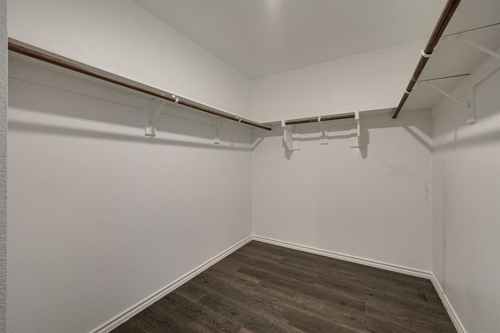 317 Sage Street Anna, TX 75409 - Photo 18 of 33 a view of a room with wooden floor