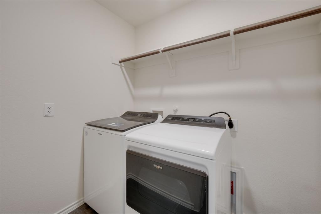 317 Sage Street Anna, TX 75409 - Photo 25 of 33 a utility room with dryer and washer