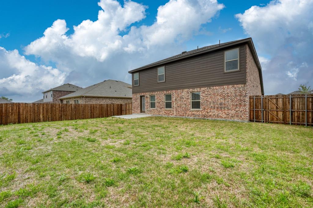 317 Sage Street Anna, TX 75409 - Photo 26 of 33 a front view of a house with a garden