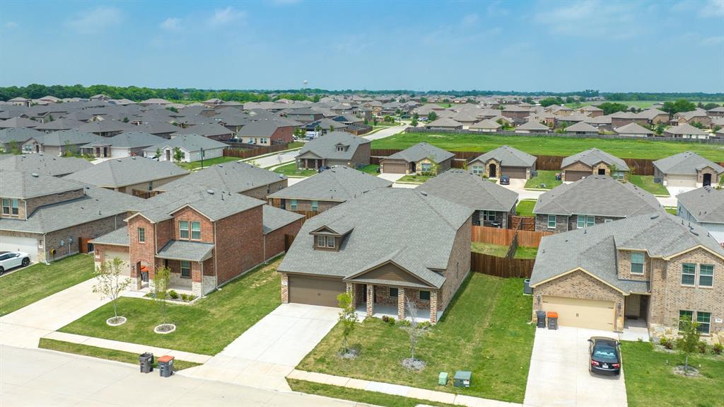 317 Sage Street Anna, TX 75409 - Photo 30 of 33 an aerial view of residential houses with outdoor space