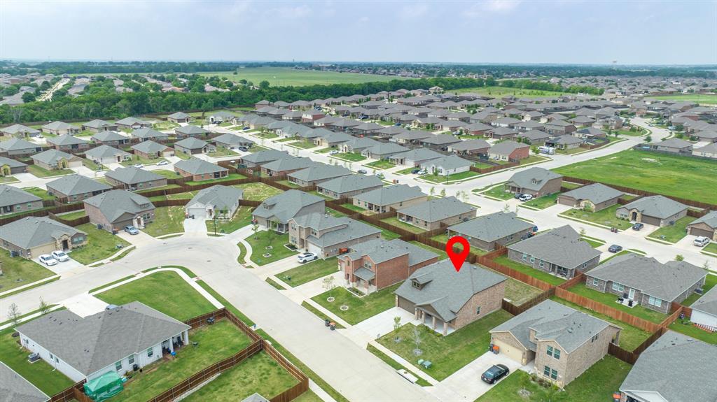 317 Sage Street Anna, TX 75409 - Photo 33 of 33 an aerial view of residential houses with outdoor space