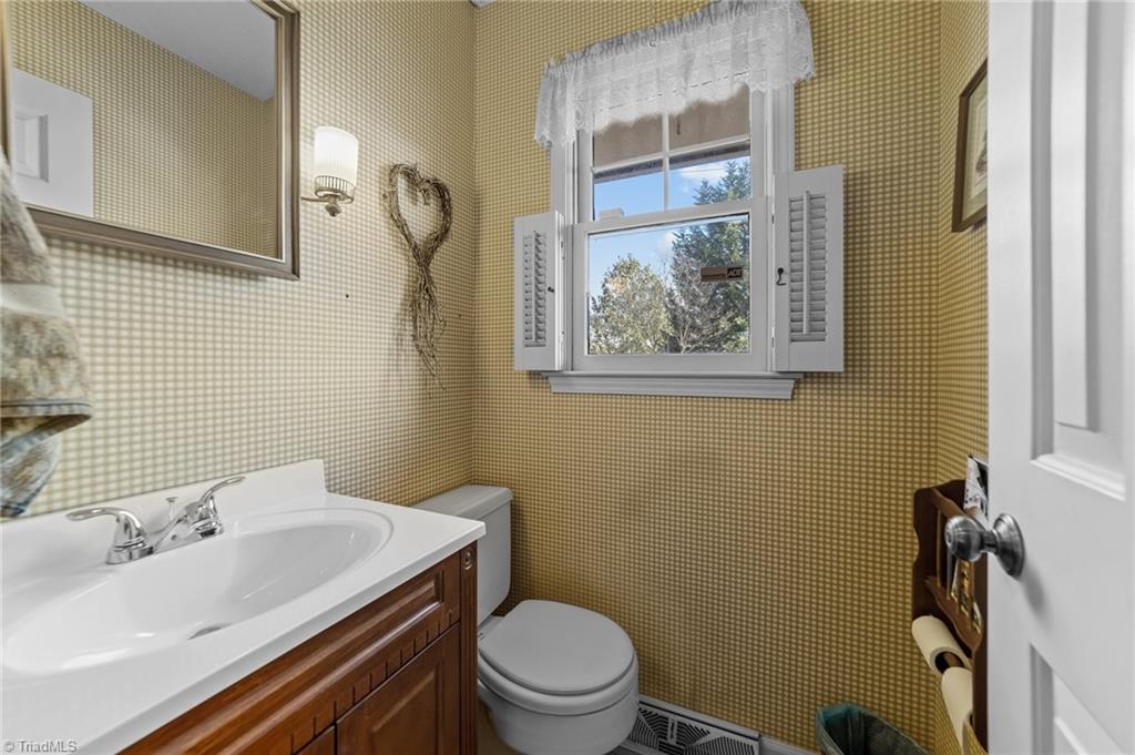 6301 Hunt Road Pleasant Garden, NC 27313 - Photo 23 of 30 half bath behind kitchen
