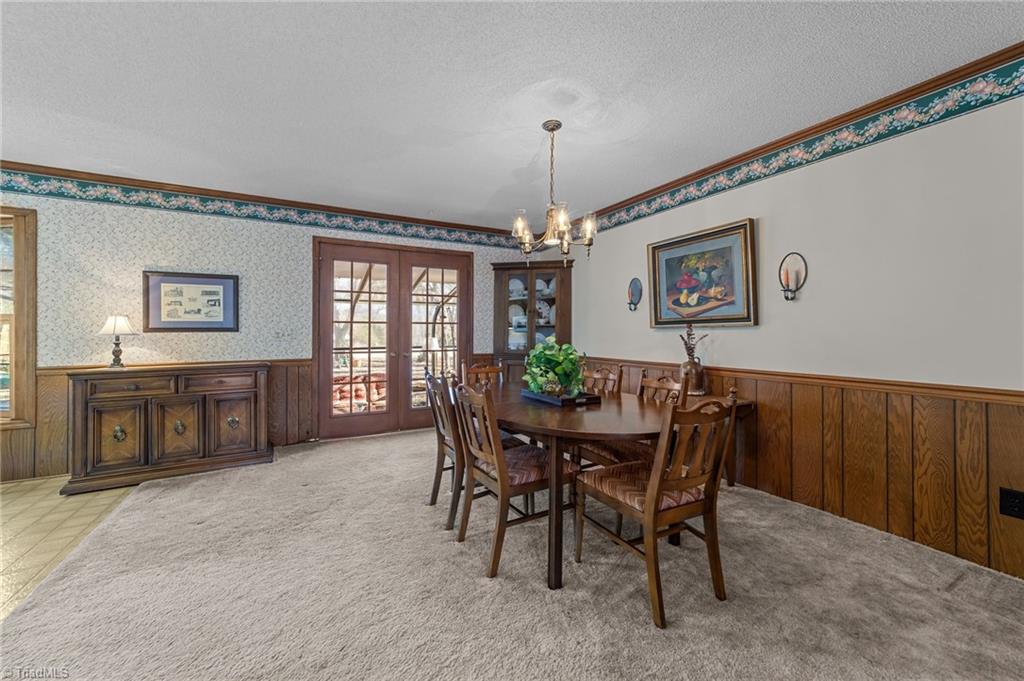6301 Hunt Road Pleasant Garden, NC 27313 - Photo 7 of 30 dining room/access to sunroom