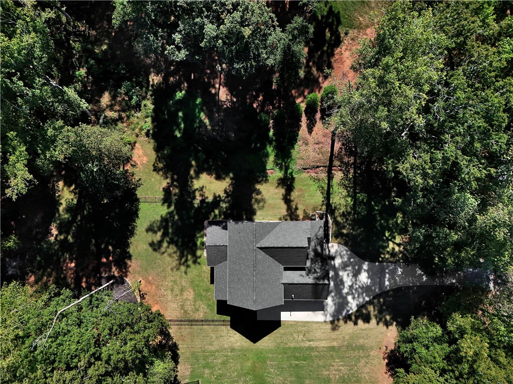 3004 Cobbs Way Anderson, SC 29621 - Photo 45 of 46 Mature trees frame a private lawn surrounding the dark shingled roofline.