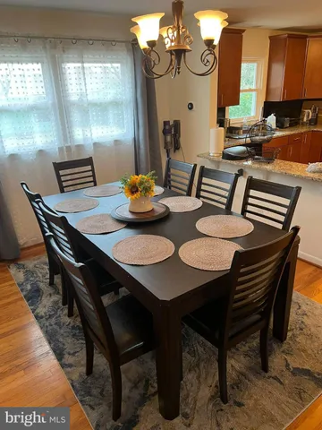 a view of a dining room with furniture