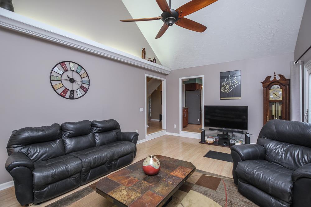 496 Horn Springs Road Lebanon, TN 37087 - Photo 11 of 30 a living room with furniture and a flat screen tv