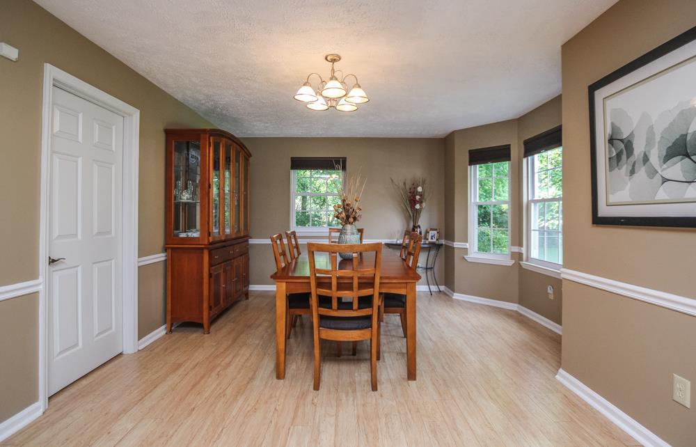 496 Horn Springs Road Lebanon, TN 37087 - Photo 12 of 30 a view of a dining room with furniture window and wooden floor