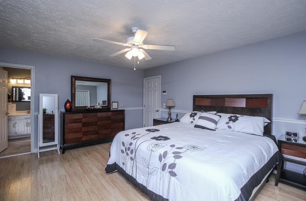 496 Horn Springs Road Lebanon, TN 37087 - Photo 18 of 30 a bedroom with a bed and a dresser