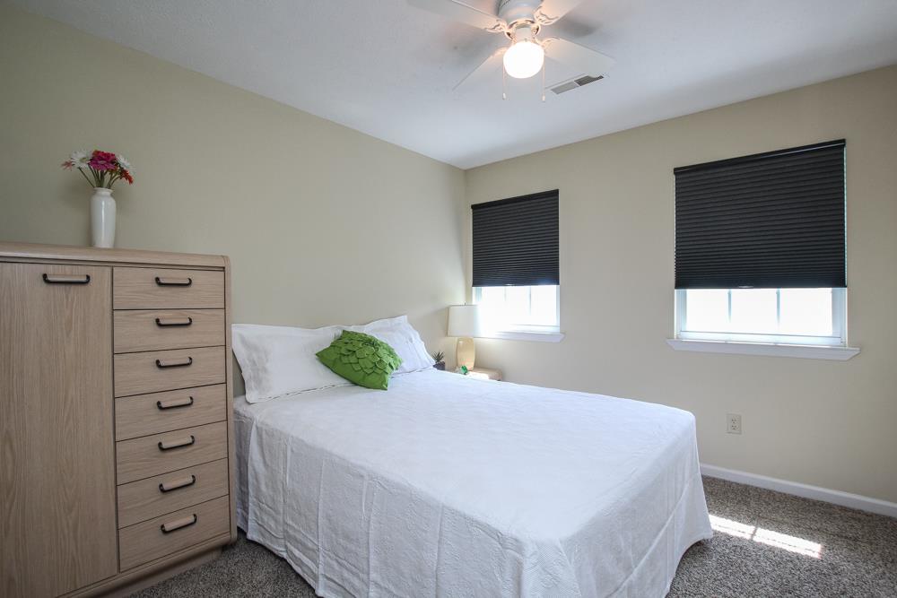 496 Horn Springs Road Lebanon, TN 37087 - Photo 20 of 30 a bedroom with a bed and a dresser