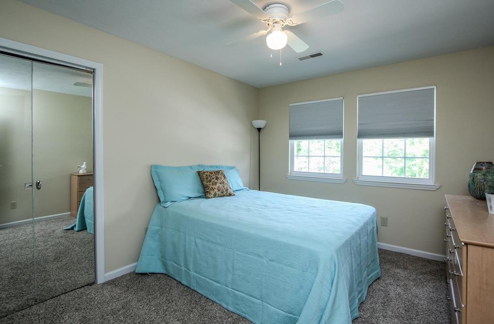 496 Horn Springs Road Lebanon, TN 37087 - Photo 21 of 30 a bedroom with a bed and a window