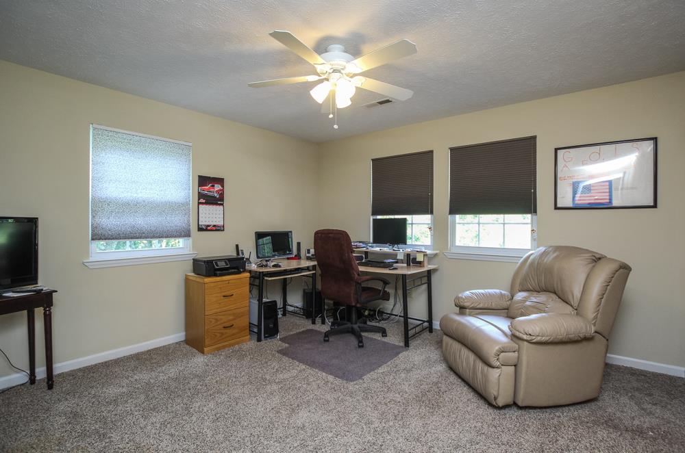 496 Horn Springs Road Lebanon, TN 37087 - Photo 24 of 30 a view of a livingroom with workspace and a couch