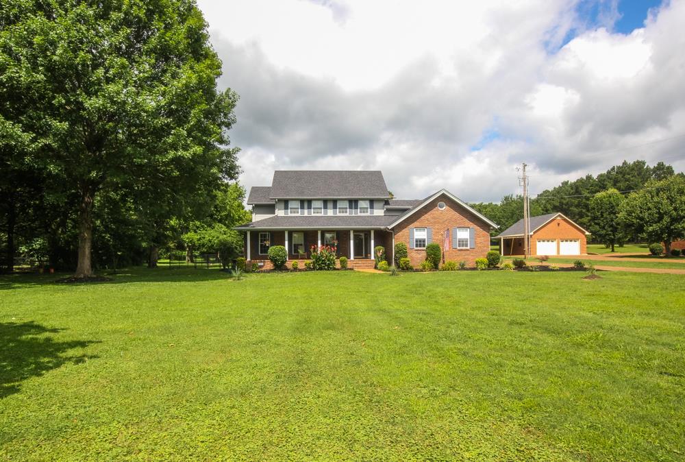 496 Horn Springs Road Lebanon, TN 37087 - Photo 5 of 30 a front view of a house with garden