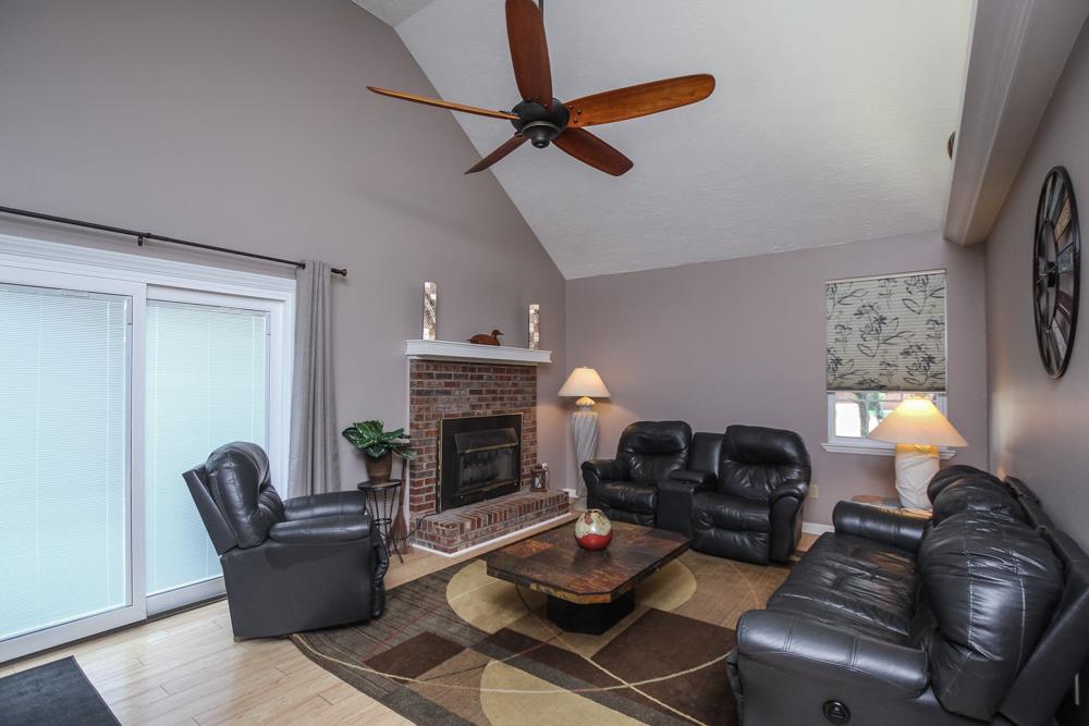 496 Horn Springs Road Lebanon, TN 37087 - Photo 10 of 30 a living room with furniture and a fireplace