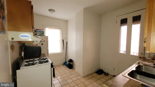 a room with furniture and a fireplace