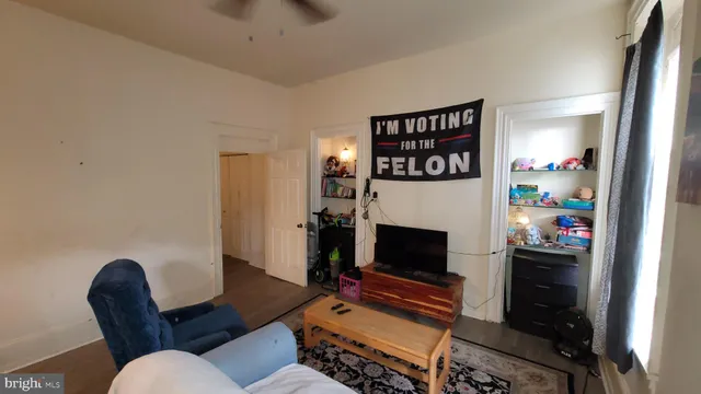 a white toilet sitting next to a bathroom sink