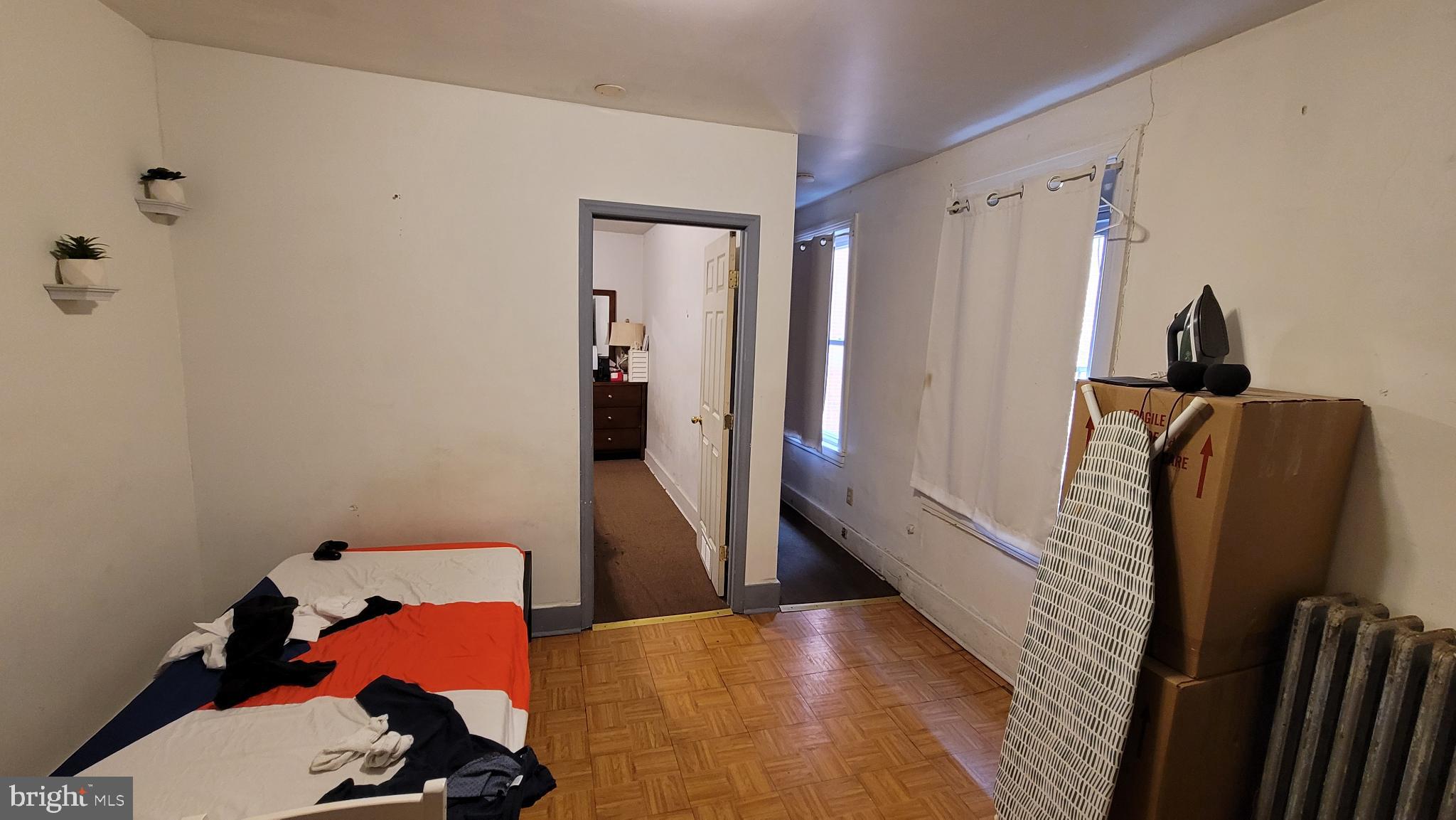 146 North 5th Street Reading, PA 19601 - Photo 32 of 53 a view of hallway with furniture and wooden floor