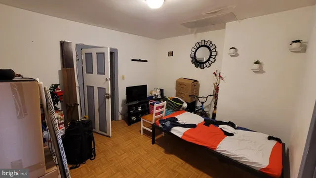 a kitchen with refrigerator and window