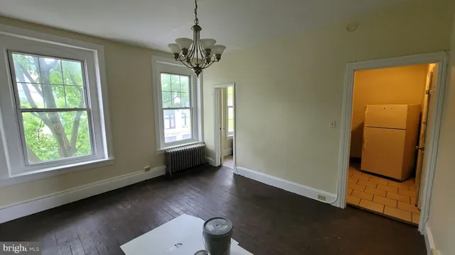 a bathroom with a toilet sink and shower
