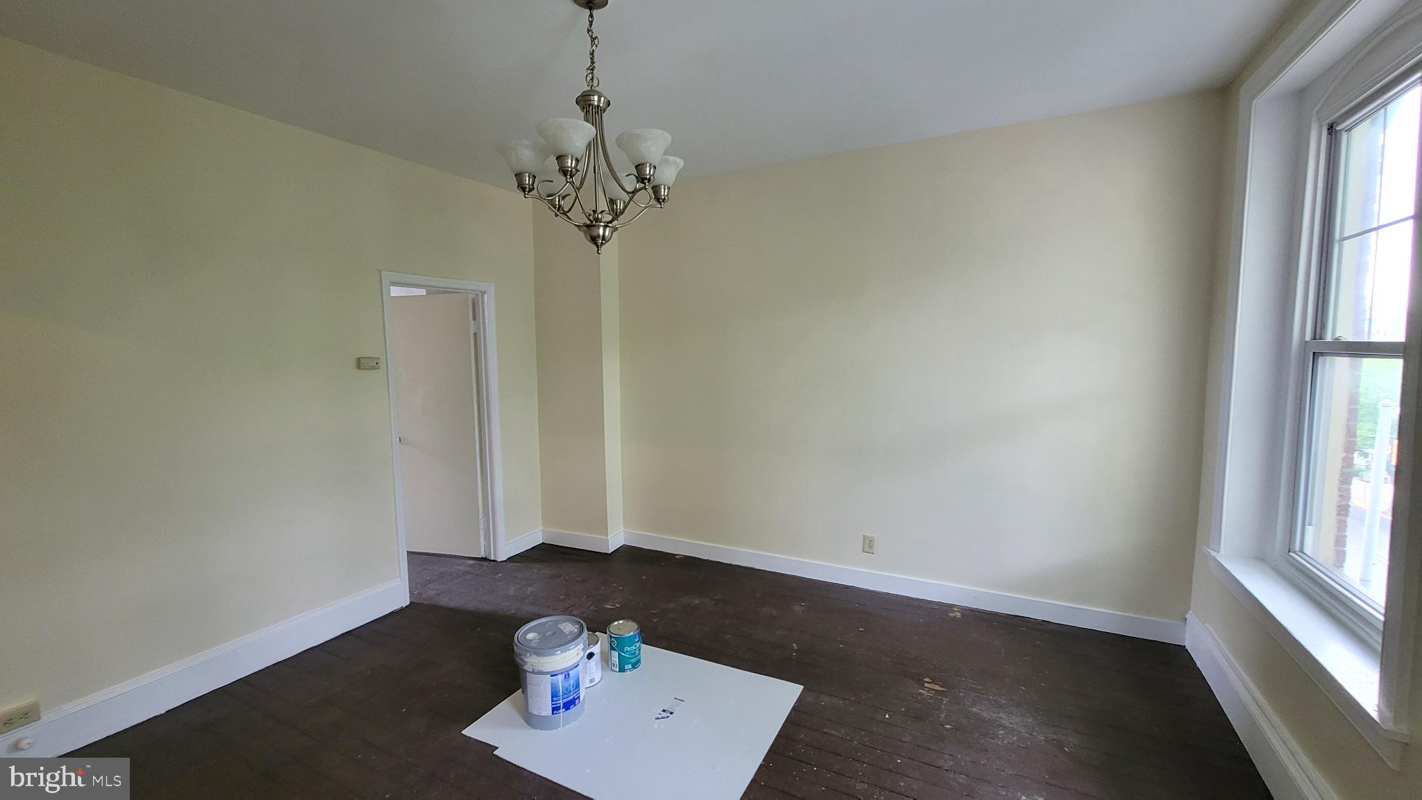 146 North 5th Street Reading, PA 19601 - Photo 44 of 53 wooden floor in an empty room with a window