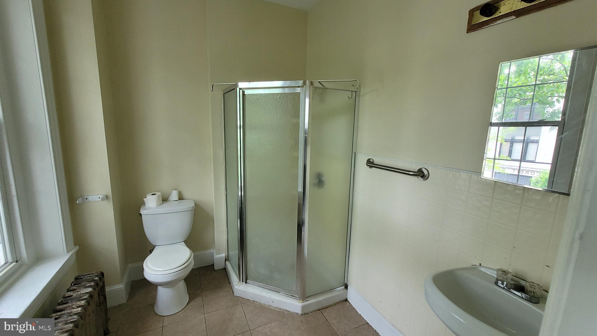 146 North 5th Street Reading, PA 19601 - Photo 45 of 53 a bathroom with a toilet sink and shower