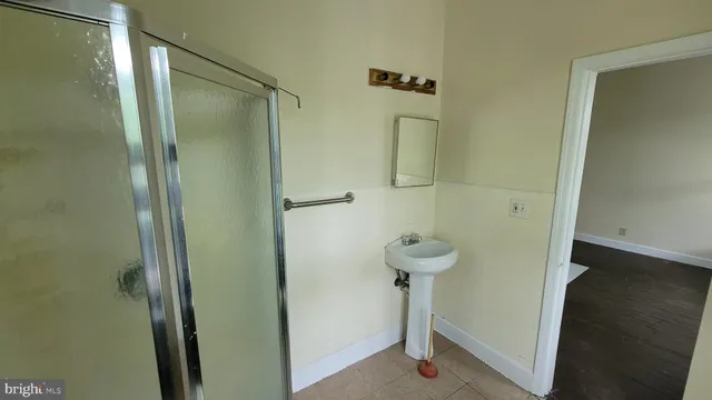 a front view of a house with parking area